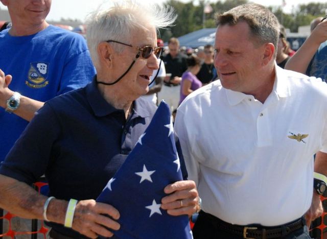 William H. Gortney was presented with a flag during the Blue Angels airshow two years ago, the day after Gortney took command of U.S. Fleet Forces (Photo submitted by Adm. Bill Gortney). 